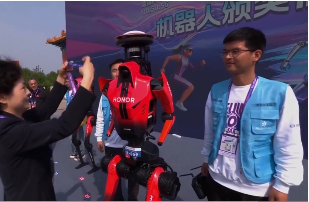 2026-04-22 09_32_27-Humanoid robot breaks half marathon world record in Beijing _ Science and Techno.png