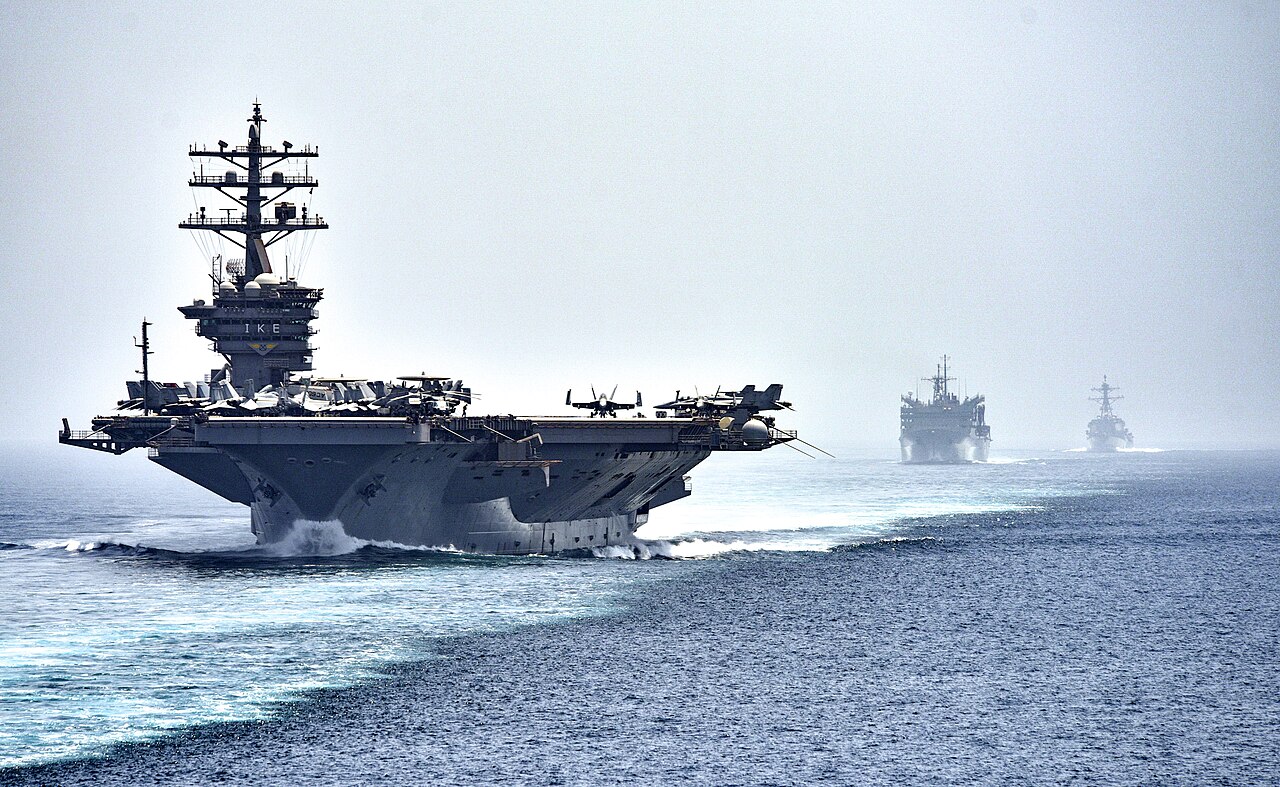 CVN_69_transits_the_Strait_of_Hormuz_(28465403076).jpg